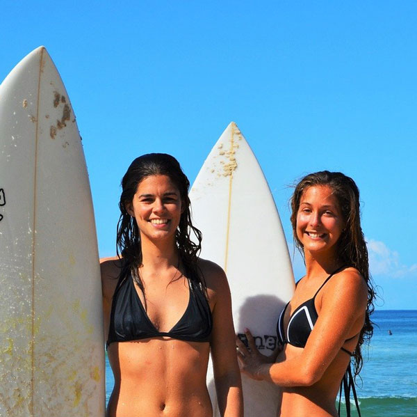 people with surfboards